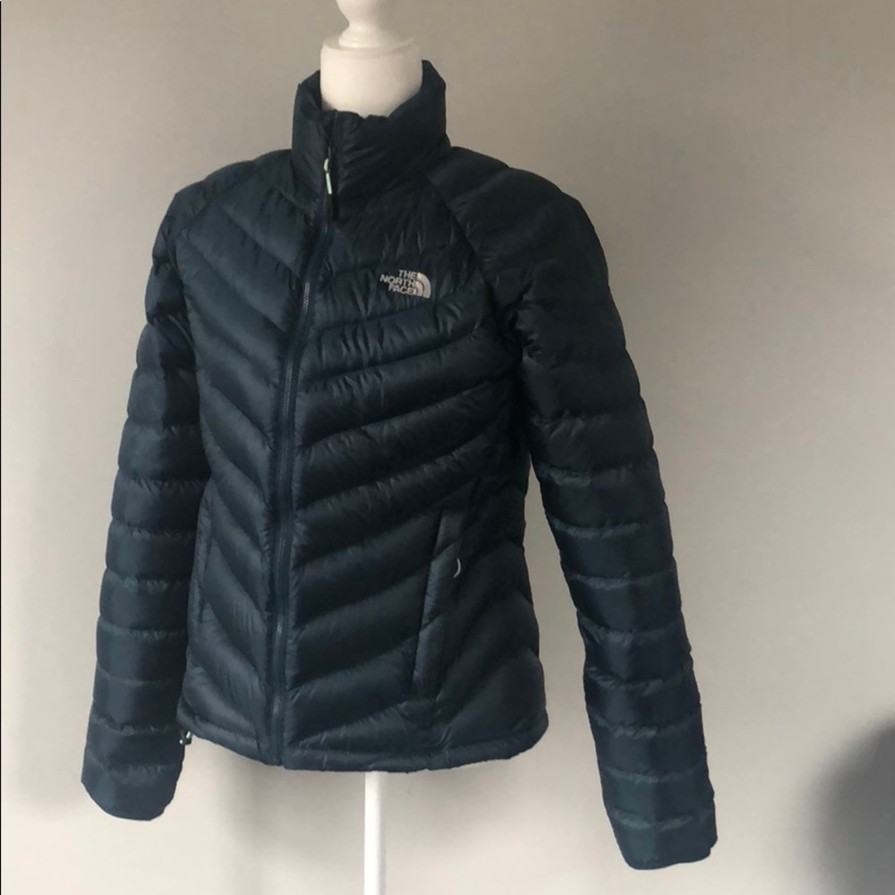 Dark green women’s North Face down jacket